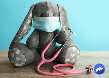 stuffed bunny wearing a medical mask