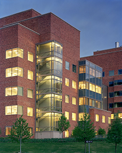 side view of the NIH Clinical Center at dusk