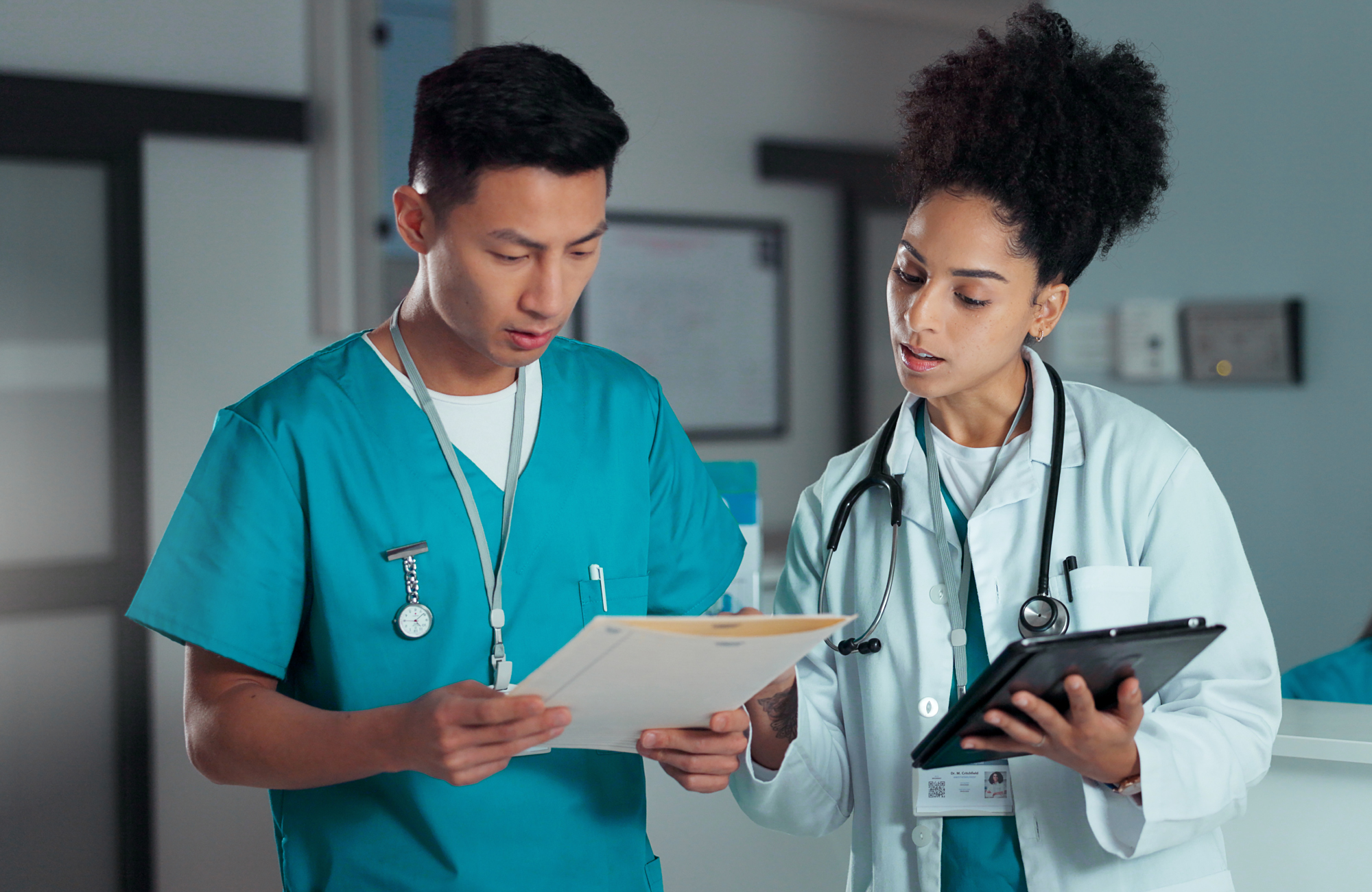 doctor and nurse conferring