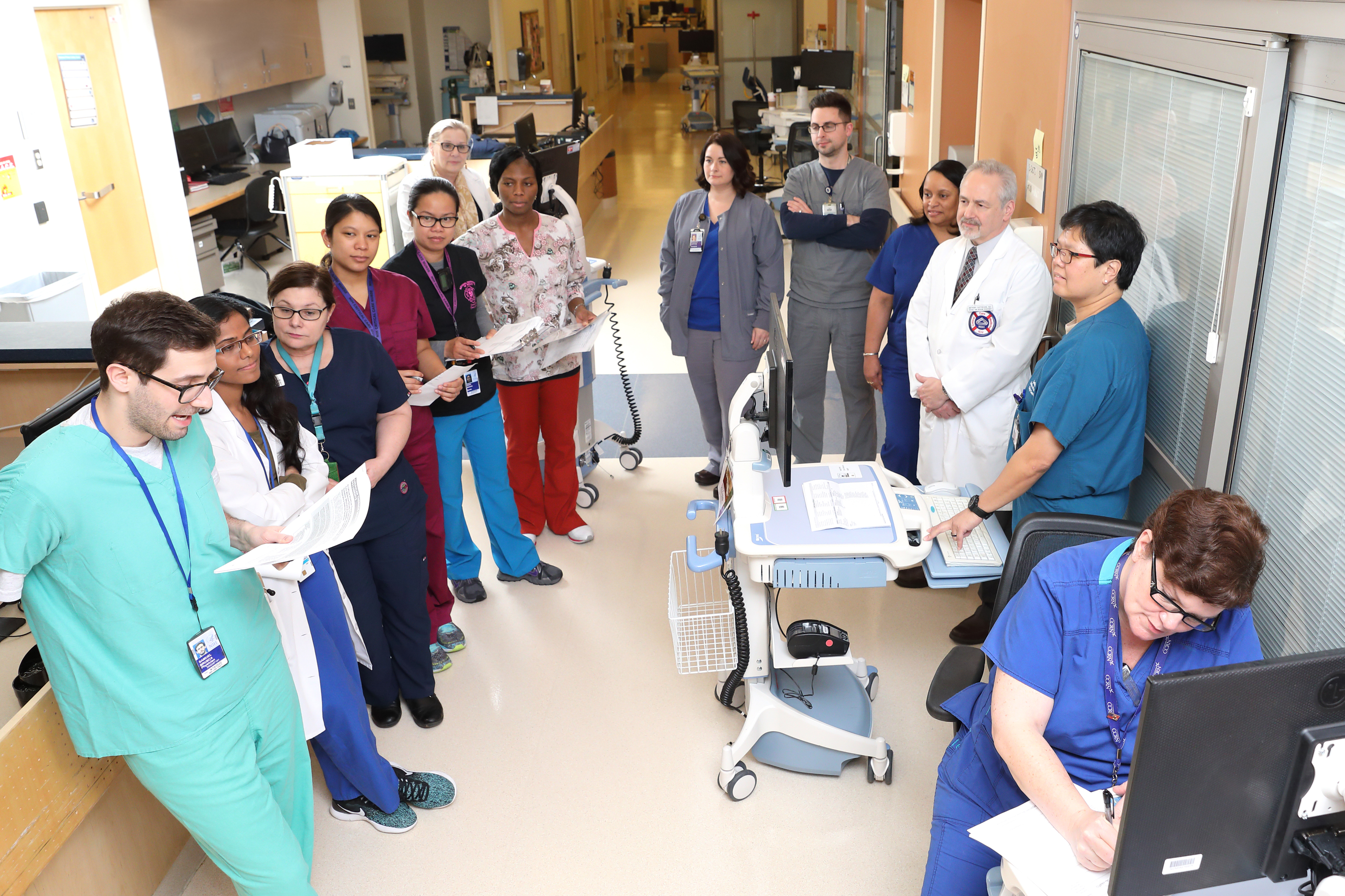 critical care staff in hospital hallway
