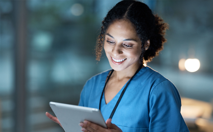 nurse holding a datapad