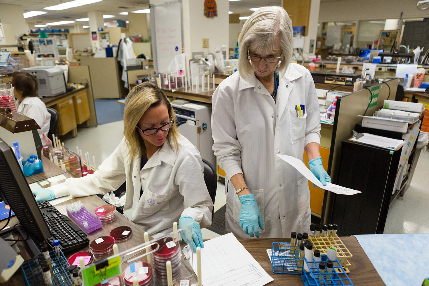 two researchers working in a lab