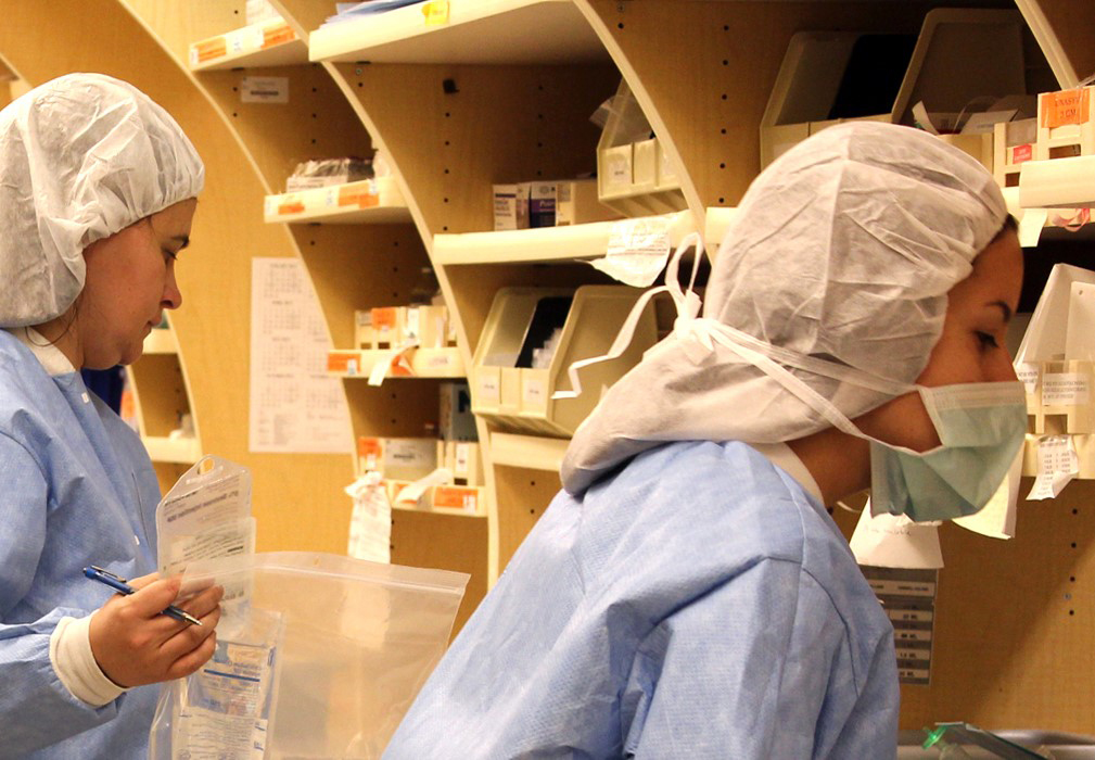 two pharmacists at work