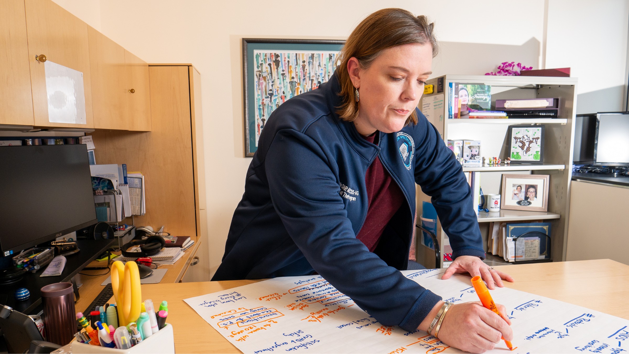 Jennifer Wilder works in her NIH CC office