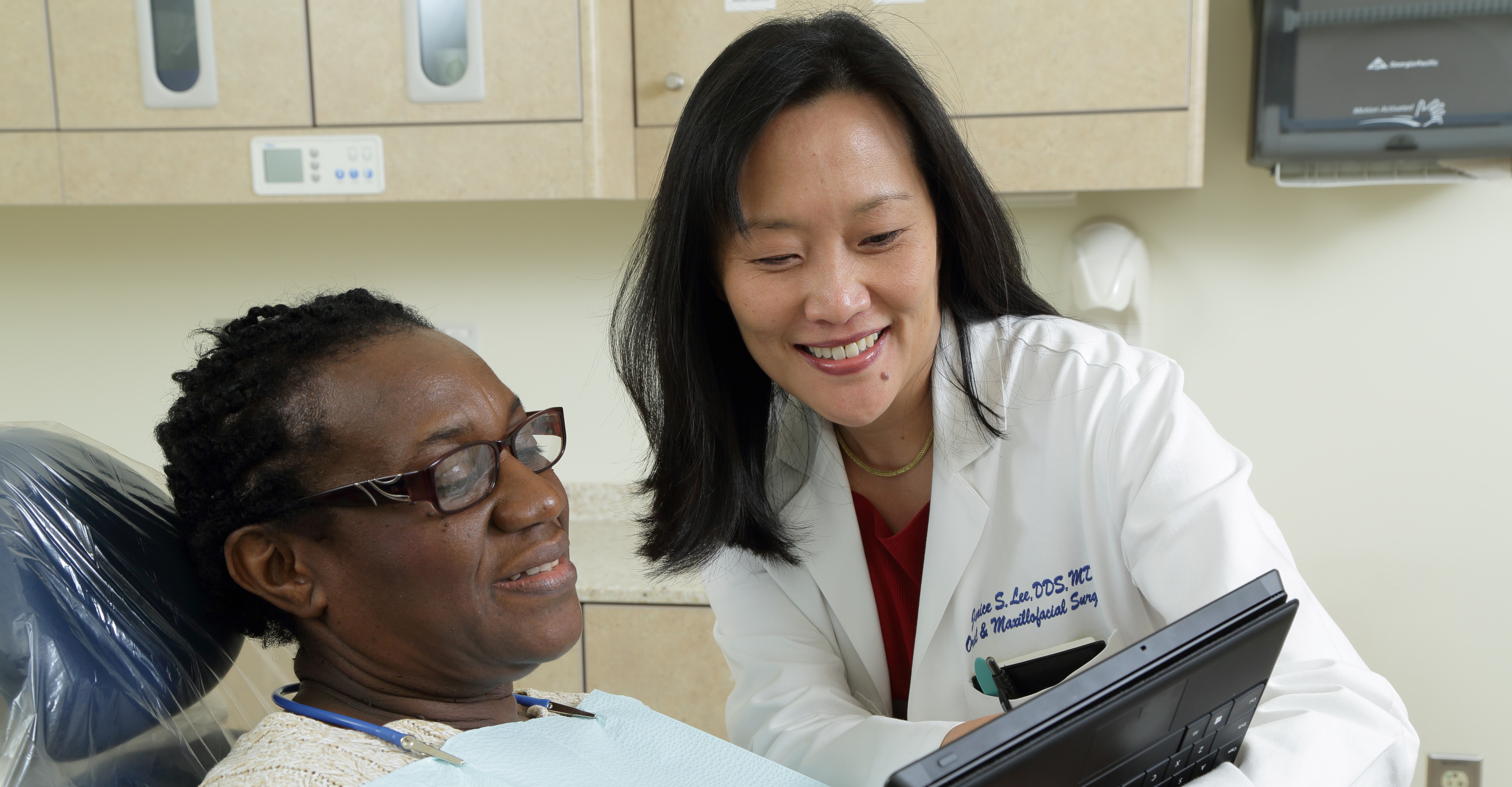 Dr. Janice Lee with a patient in the dental clinic