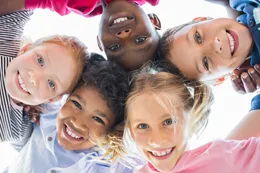 Children grouped together in a circle