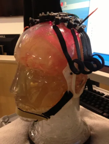 An image of our custom designed fNIRS probe utilized to measure activity from the motor areas of the brain during movement execution.