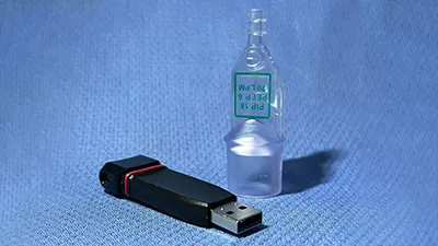 thumbdrive next to a medical device